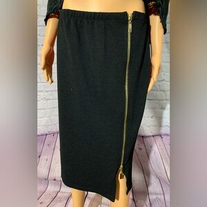 Women’s Black skirt with gold full length zipper. Brand: Olivia Blu Size XL